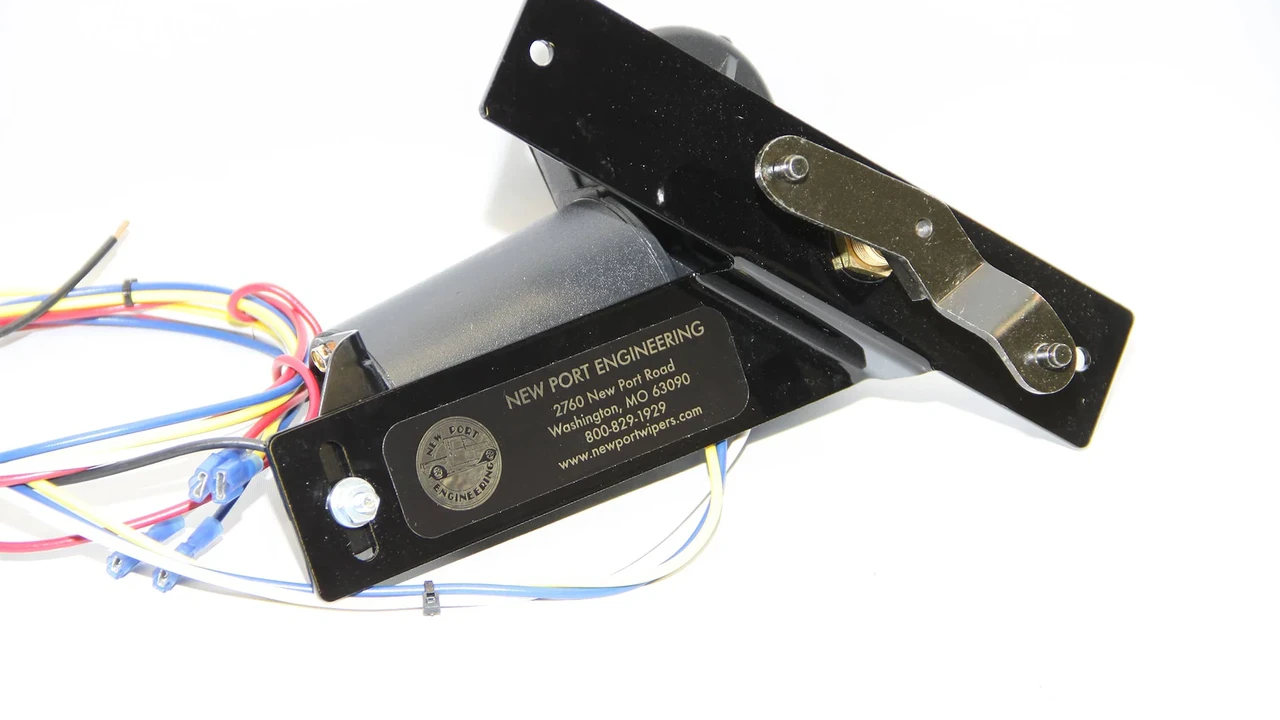 blue bowl of black bean beef tortilla soup on a board with cilantro and shredded cheese in background